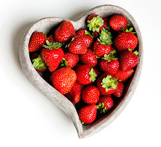 strawberries in heart-shaped bowl