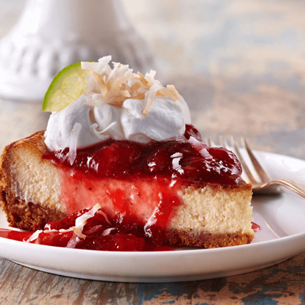 Coconut Lime Cheesecake with Strawberry Sauce