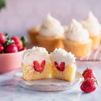 Strawberry Stuffed Vanilla Cupcakes