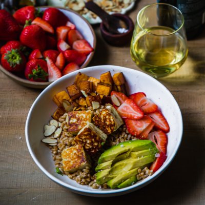 Farro bowl with grilled halloumi, California strawberries